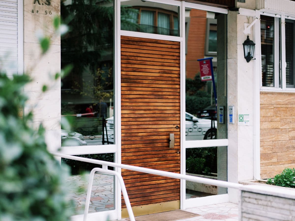 The planted entrance of a residential apartment building