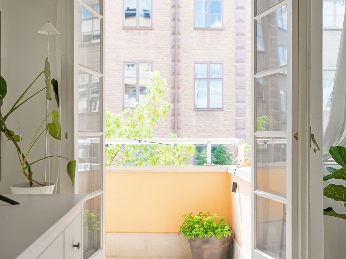 Open balcony doors in a bright apartment